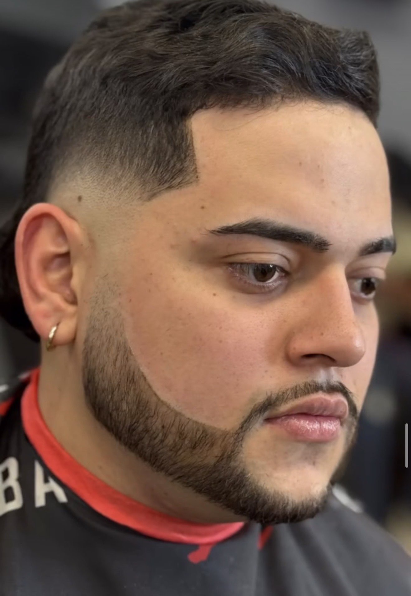 Skin fade with beard line up and full beard shape