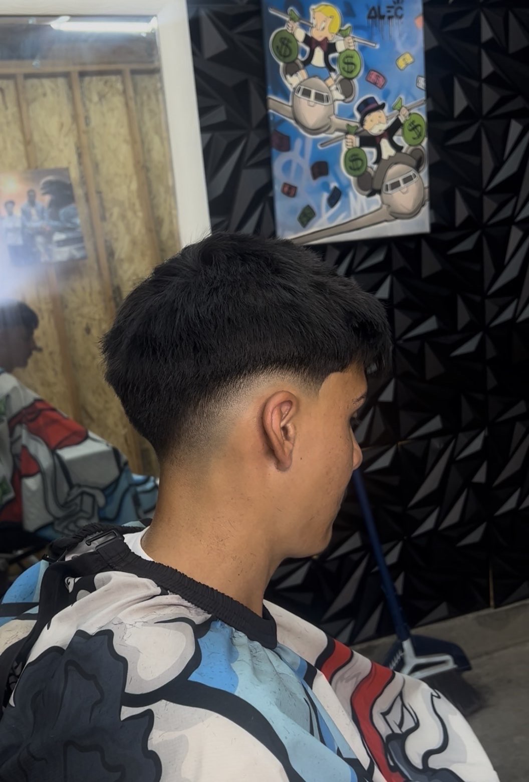 Blunt textured taper fade at Don Barbas