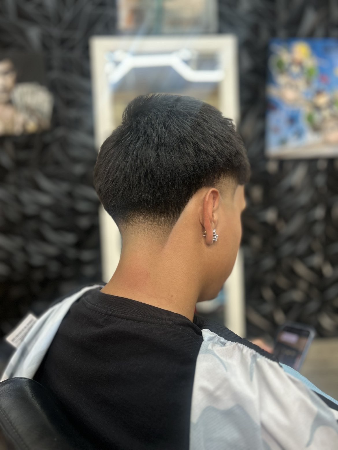 Clean low taper fade from the back